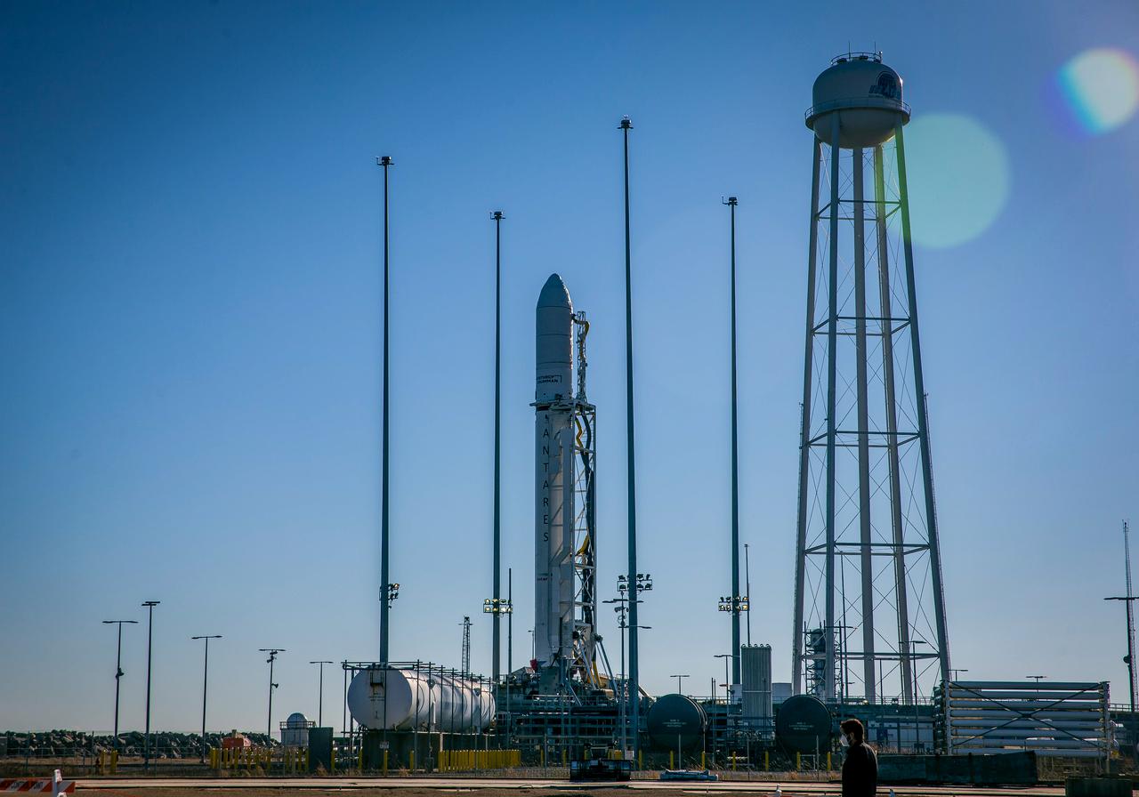 A Northrop Grumman Antares rocket carrying a Cygnus resupply spacecraft is in the vertical launch position on the Mid-Atlantic Regional Spaceport’s Pad-0A, Tuesday, Feb. 16, 2021, at NASA's Wallops Flight Facility in Virginia. Northrop Grumman’s 15th contracted cargo resupply mission with NASA to the International Space Station will deliver about 8,000 pounds of science and research, crew supplies and vehicle hardware to the orbital laboratory and its crew. The CRS-15 Cygnus spacecraft is named after NASA mathematician, Katherine Johnson, a Black woman who time and again broke through barriers of gender and race. The launch is scheduled 12:36 p.m. EST, Feb. 20, 2021. Photo Credit: (NASA/Patrick Black)